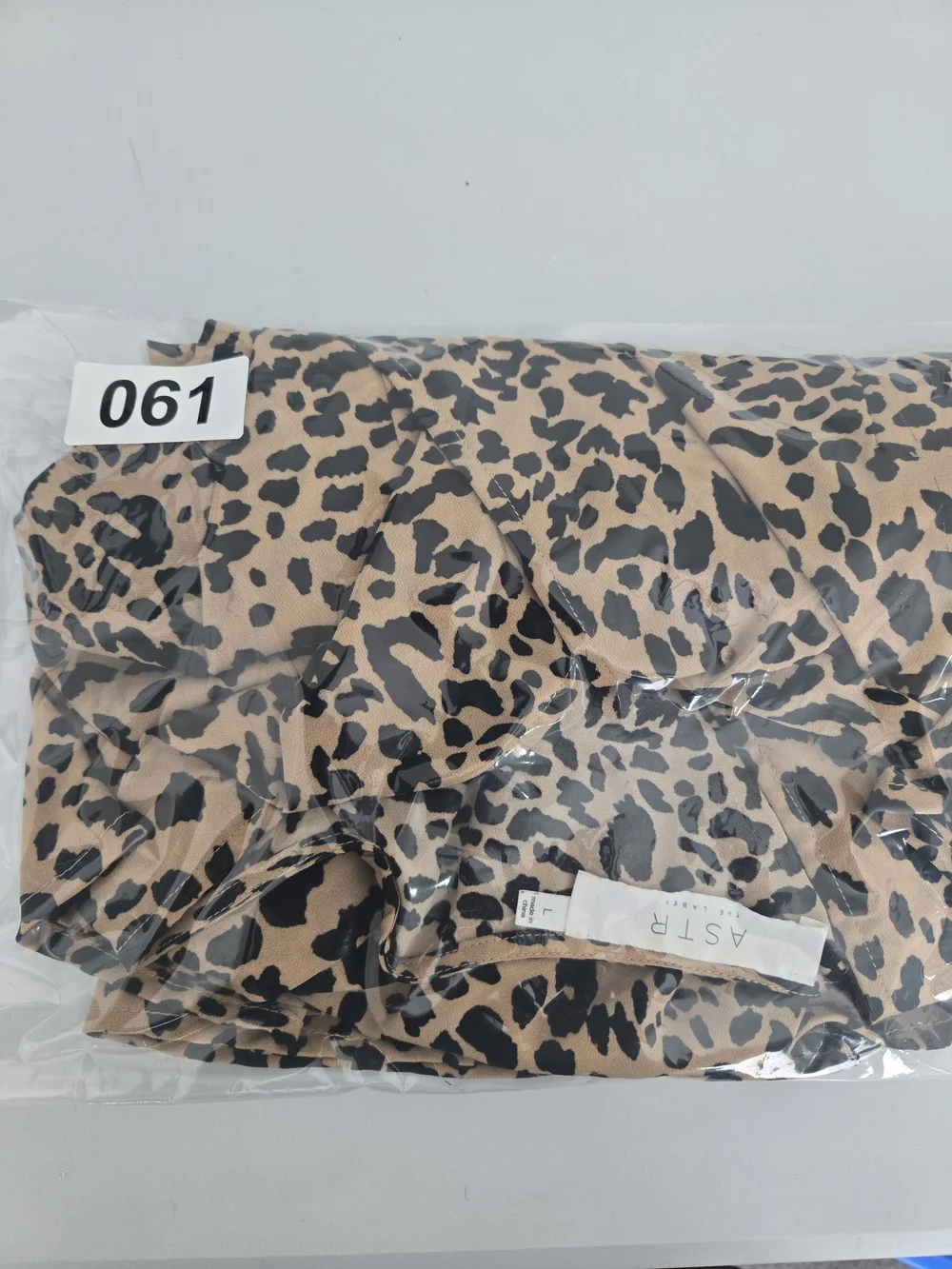 ASTR Tan and Black Leopard-Print Peplum Blouse